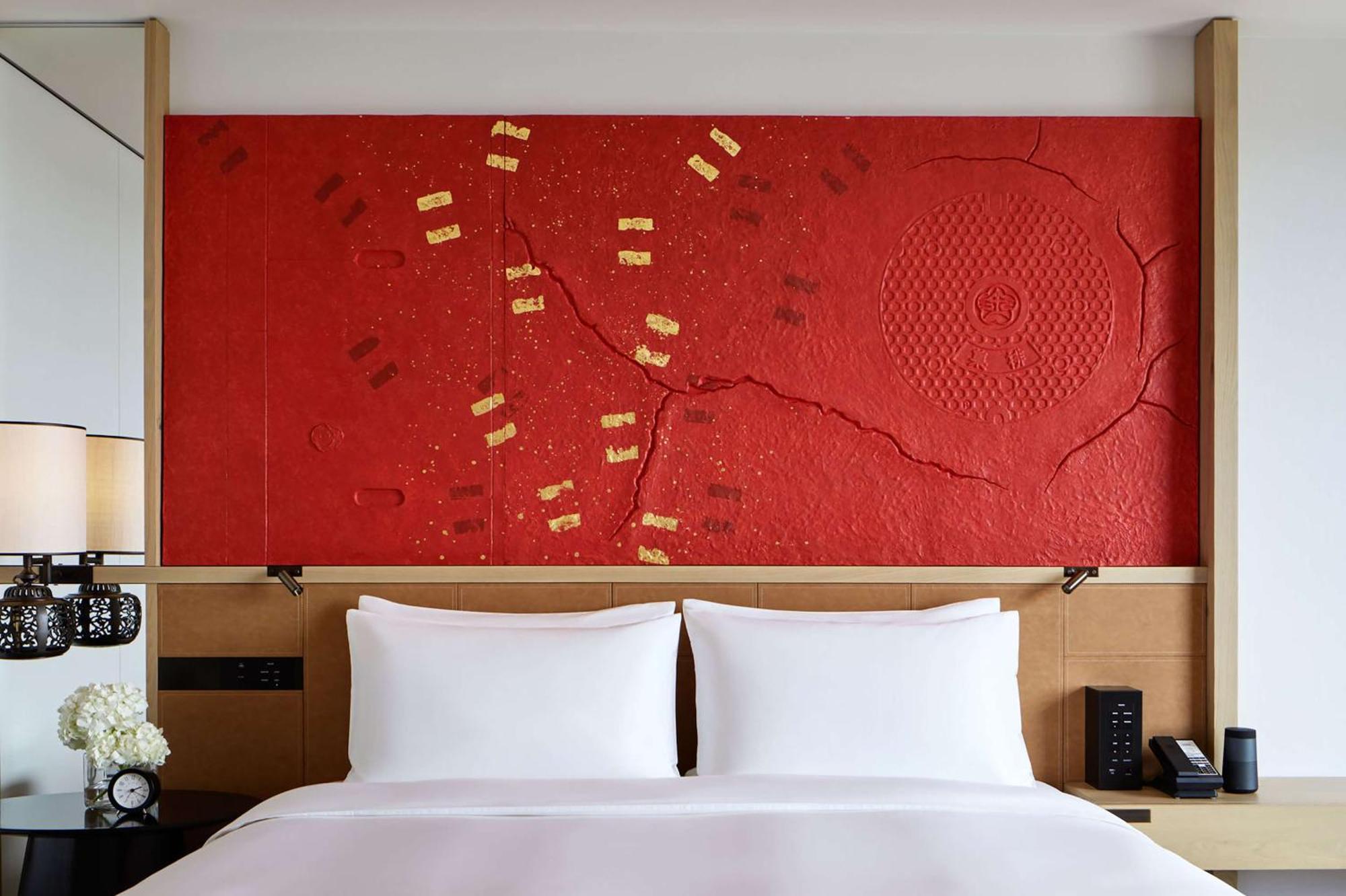 Hyatt Centric Kanazawa Exterior photo A bed with a headboard
